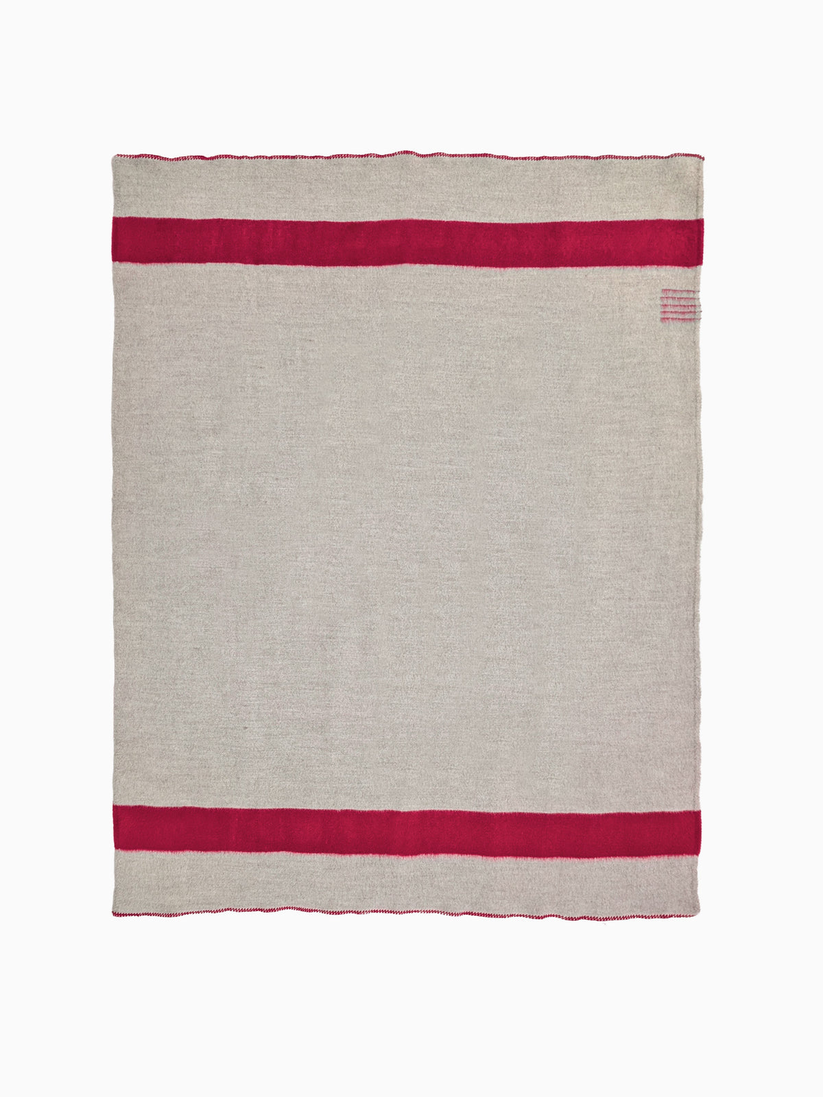 Flat-lay studio view of a heavy grey natural wool blanket with twin horizontal red stripes.