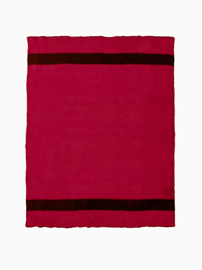Studio product flat-lay showing a full red handwoven wool blanket with two horizontal black stripes.