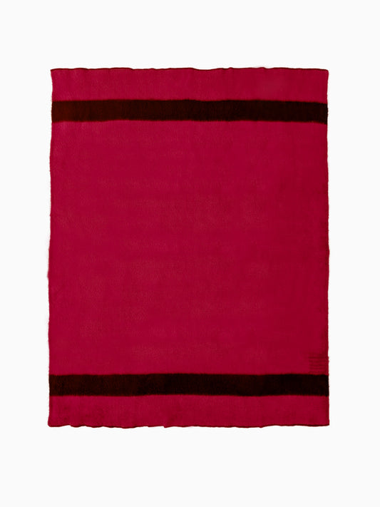 Studio product flat-lay showing a full red handwoven wool blanket with two horizontal black stripes.