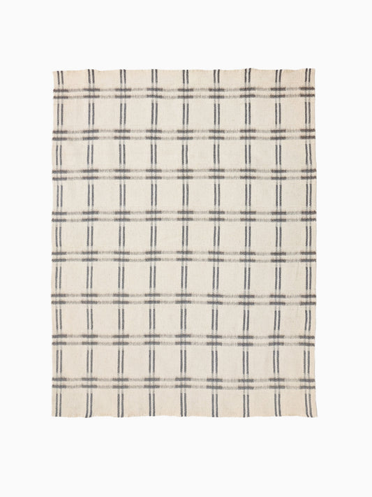 Full view of handwoven undyed wool blanket in natural ivory and taupe with geometric check weave