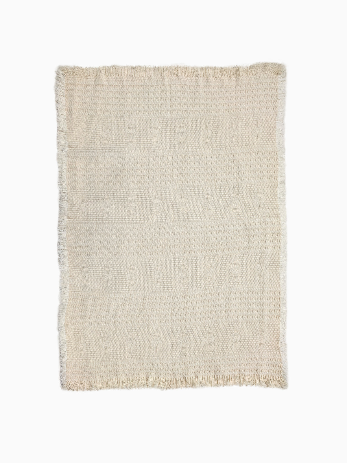 Undyed wool throw from pure wool with  structured weave detail and fringes