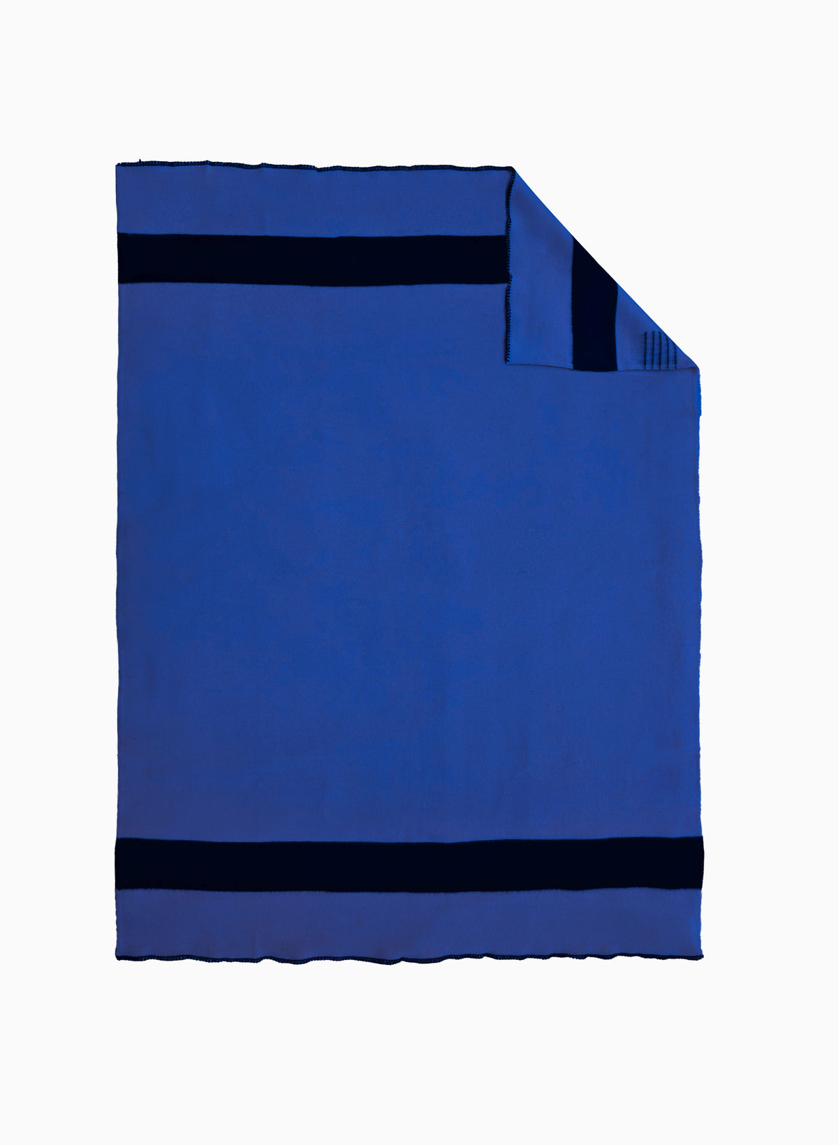 A handmade artisan royal blue blanket with two black stripes, shown flat with one corner folded over.