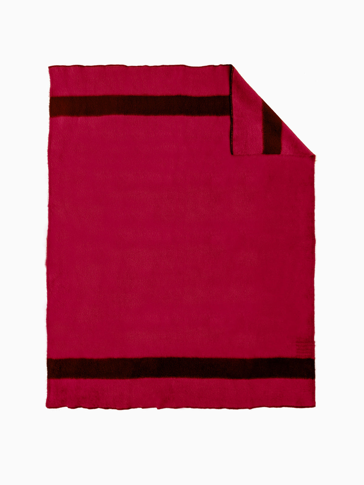 A handwoven striped wool throw blanket in solid magenta-red with black stripes, and a flipped corner. 