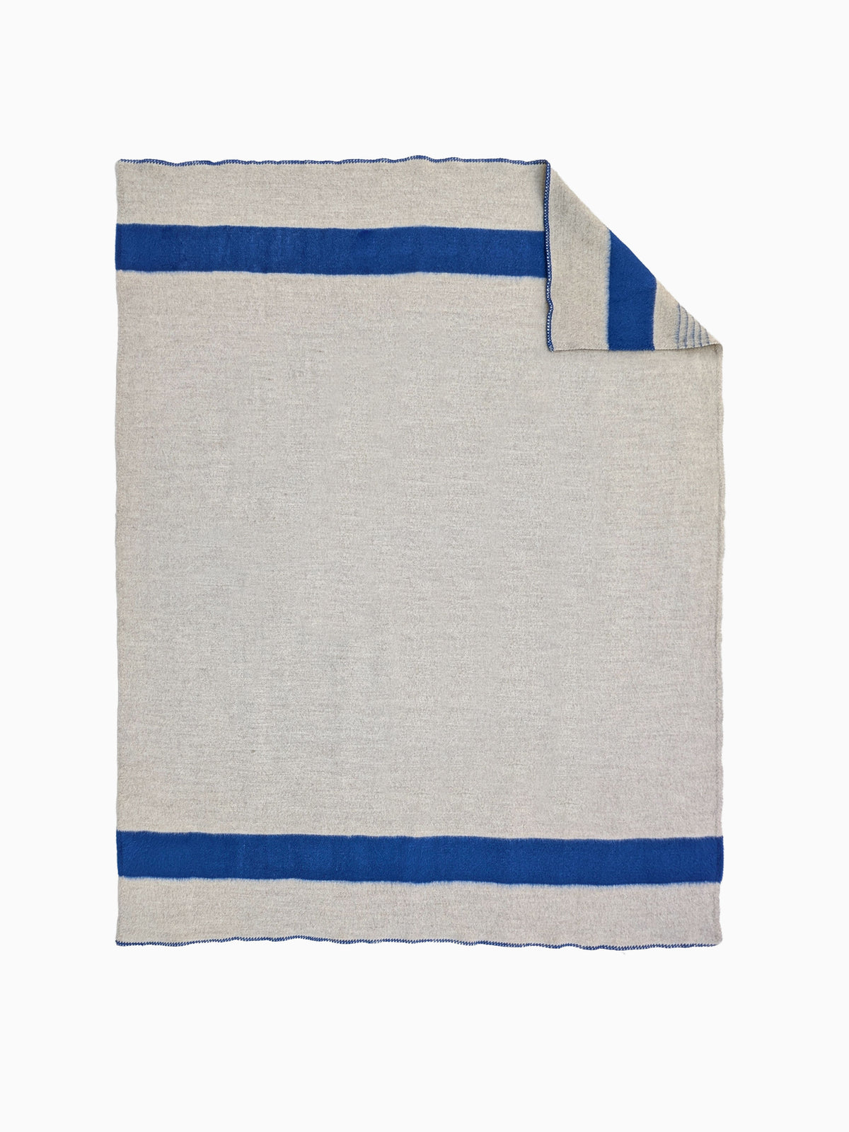 A light gray hand woven wool throw with two bold horizontal navy-blue stripes, shown flat, with one corner folded over.