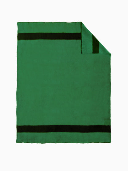A green handwoven wool blanket with black stripes, shown flat with one corner folded over.