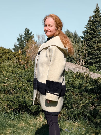 Woman wearing swing wool coat, handmade capote coat, repurposed from pure wool  blanket.