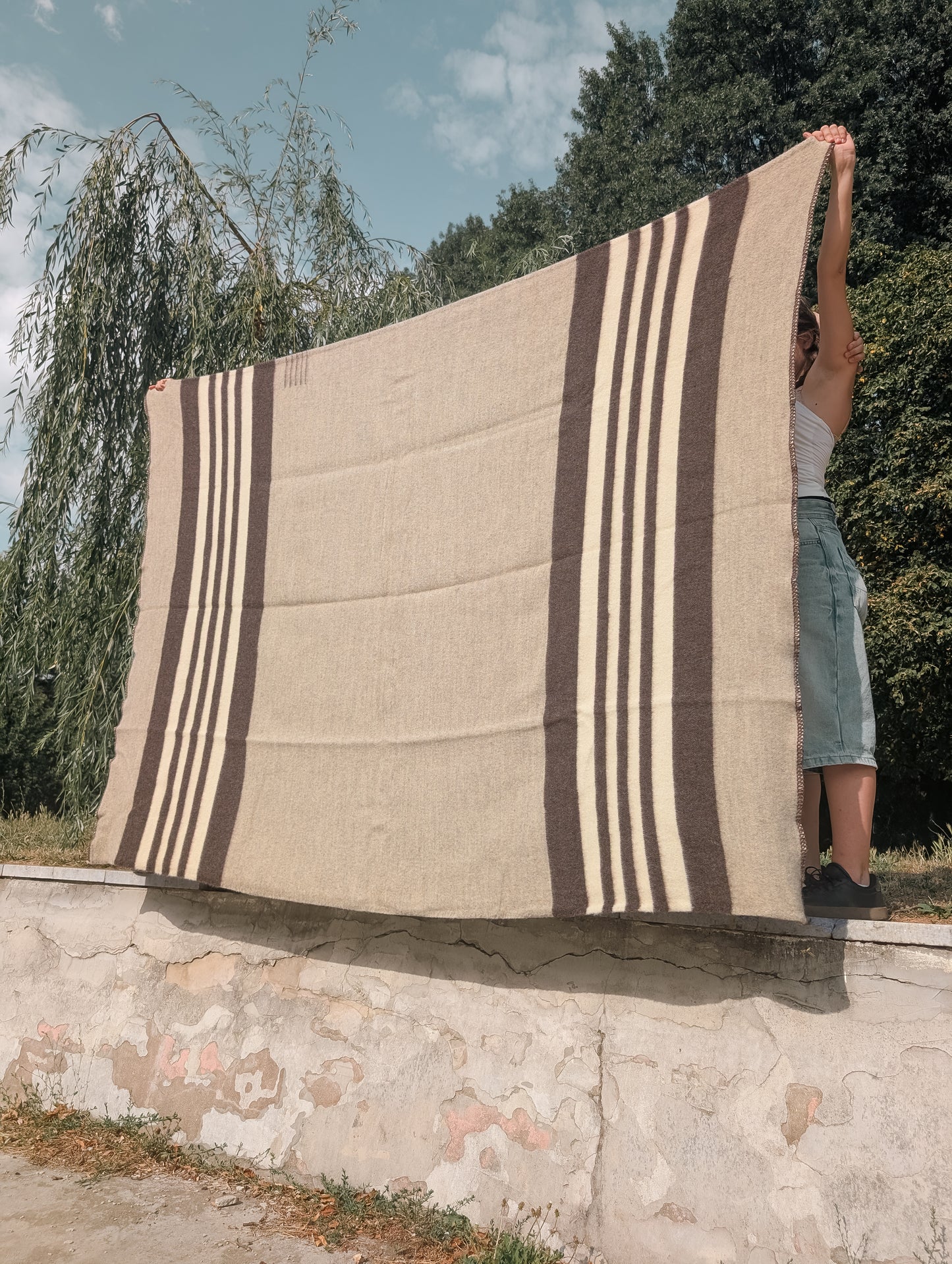 a thick warm heritage zero dye wool bedding perfect for cabins, campging and rustic style, or as heritage home decor, all handwoven from pure sheep wool