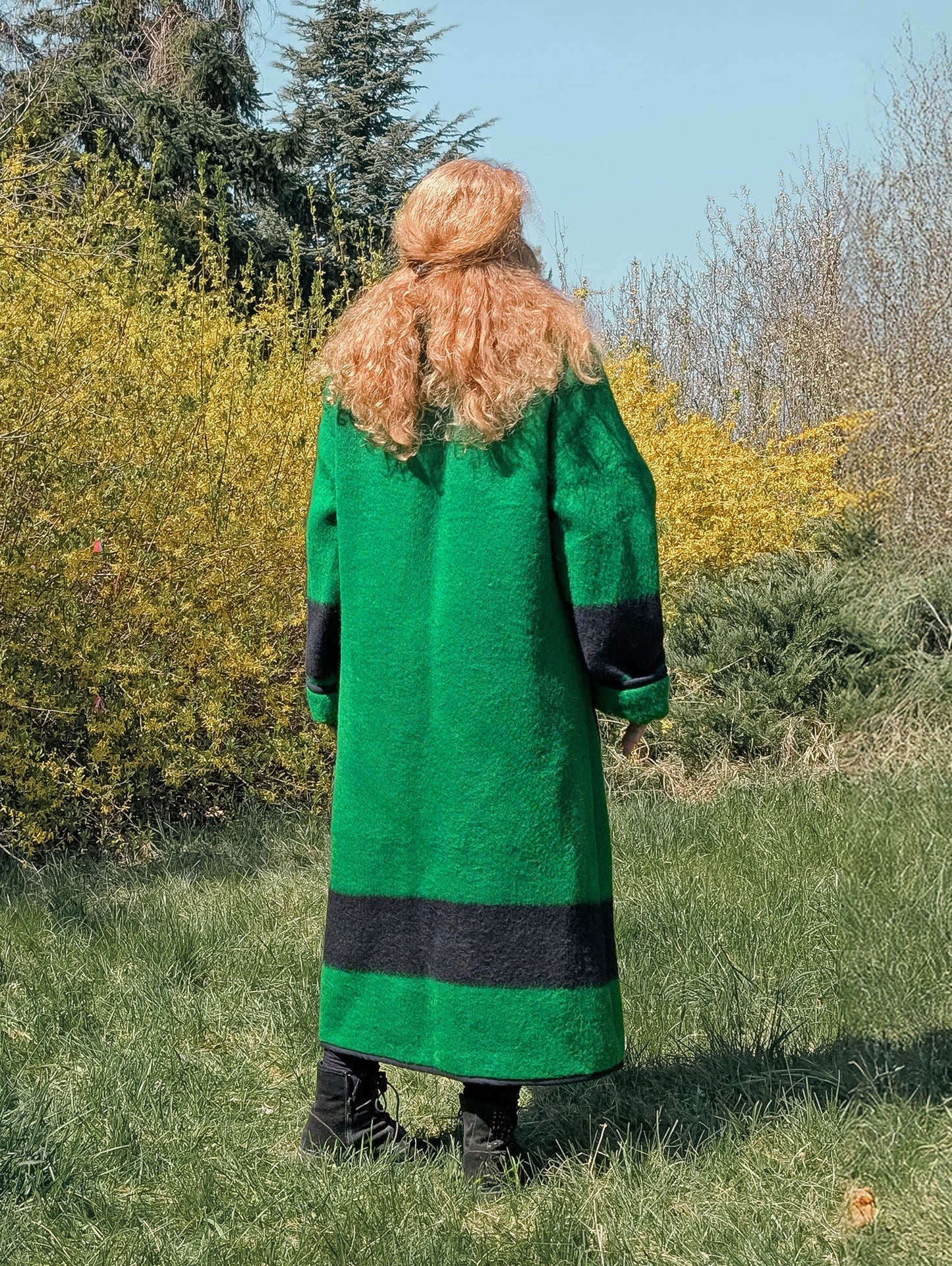 Long reenactment coat, featuring a wide collar and repurposed from a natural sheep wool  blanket in solid green with a black stripe.