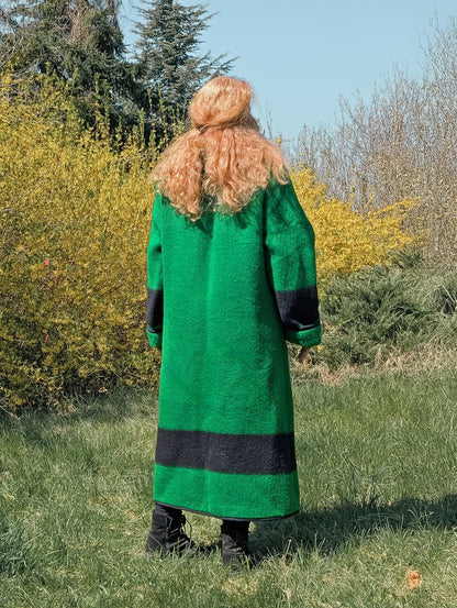 Long reenactment coat, featuring a wide collar and repurposed from a natural sheep wool  blanket in solid green with a black stripe.