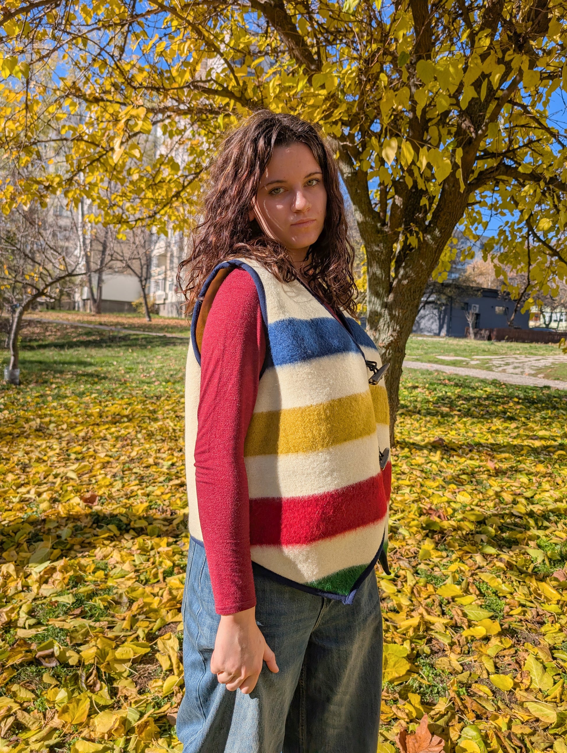 Woman wearing premium quality bespoke blanket sleeveless jacket, suitable for all ocassions, looking best on any age. A unisex outerwear for modern sustainable life.