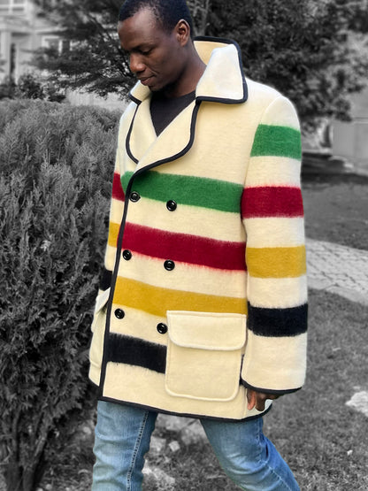Cool fashion wool blanket coat with cream base and multi stripes.