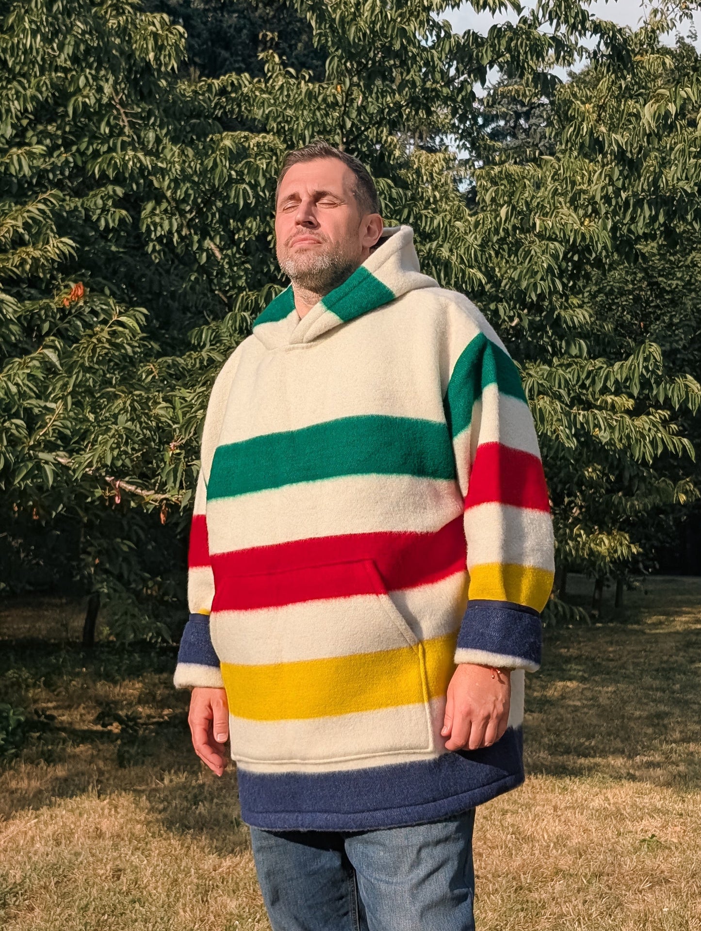 Person wearing a beautiful warm wool blanket anorak for best protection.