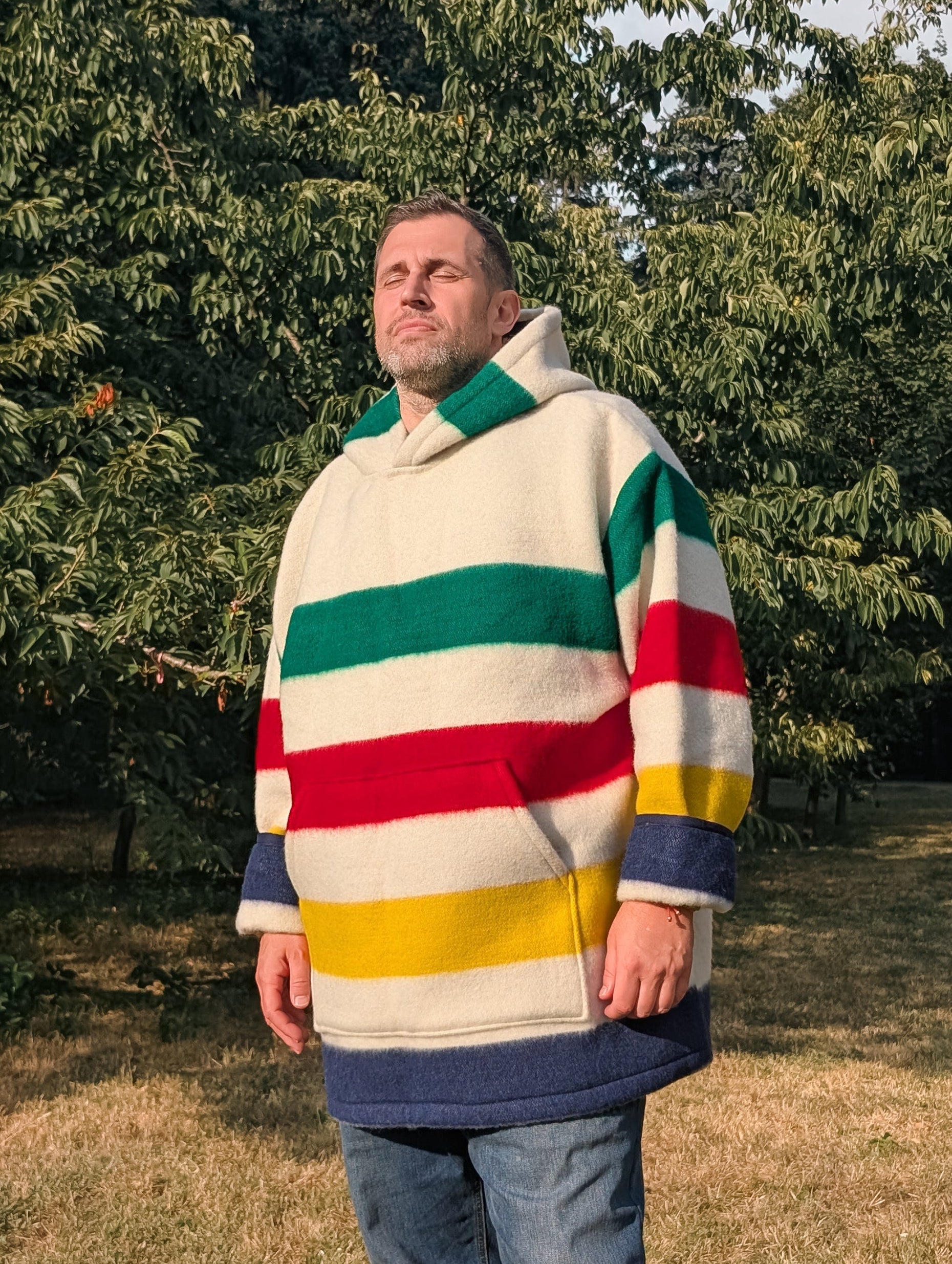 Person wearing a beautiful warm wool blanket anorak for best protection.