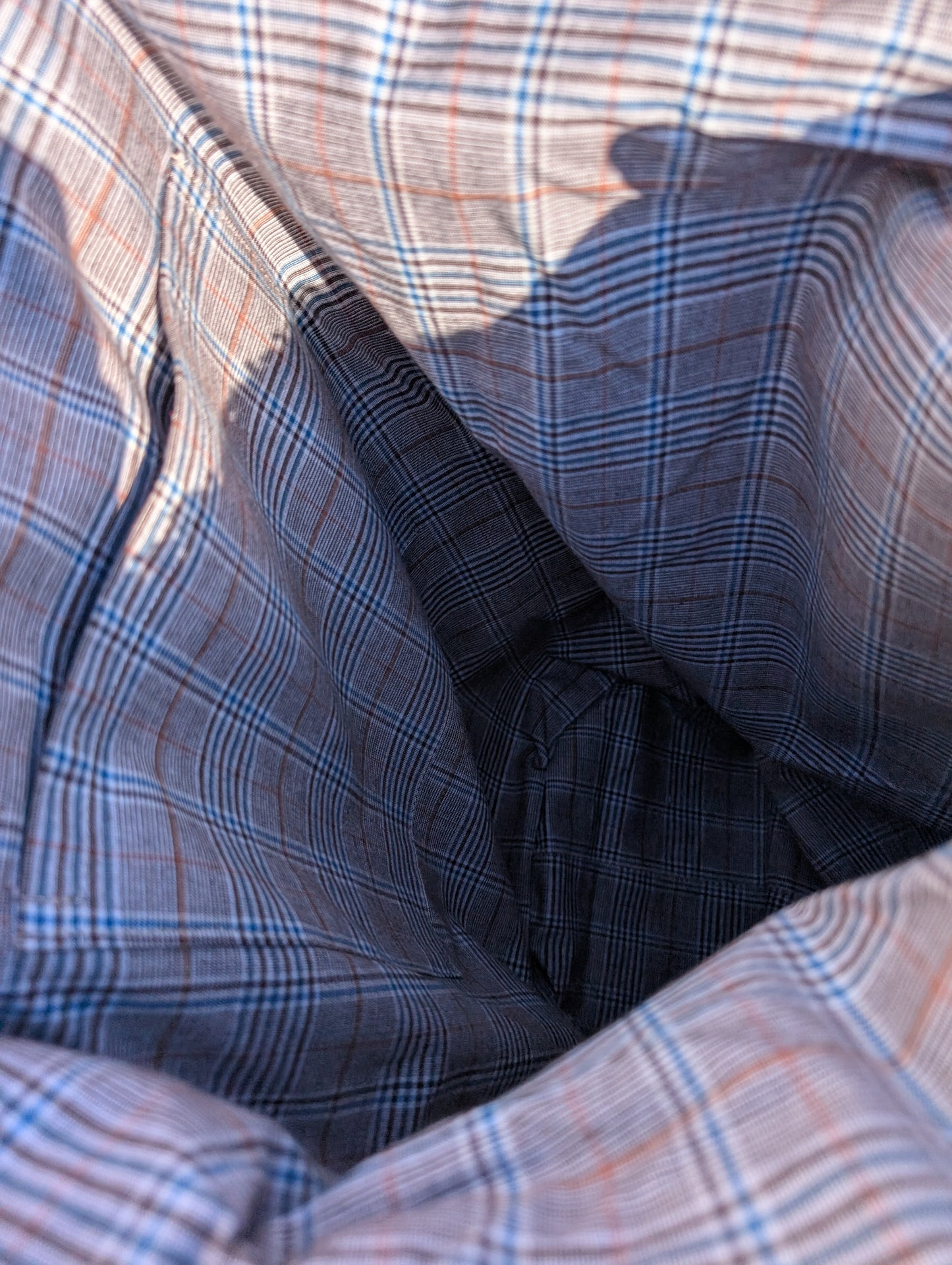 Close-up of plaid cotton lining with a focus on texture and pattern