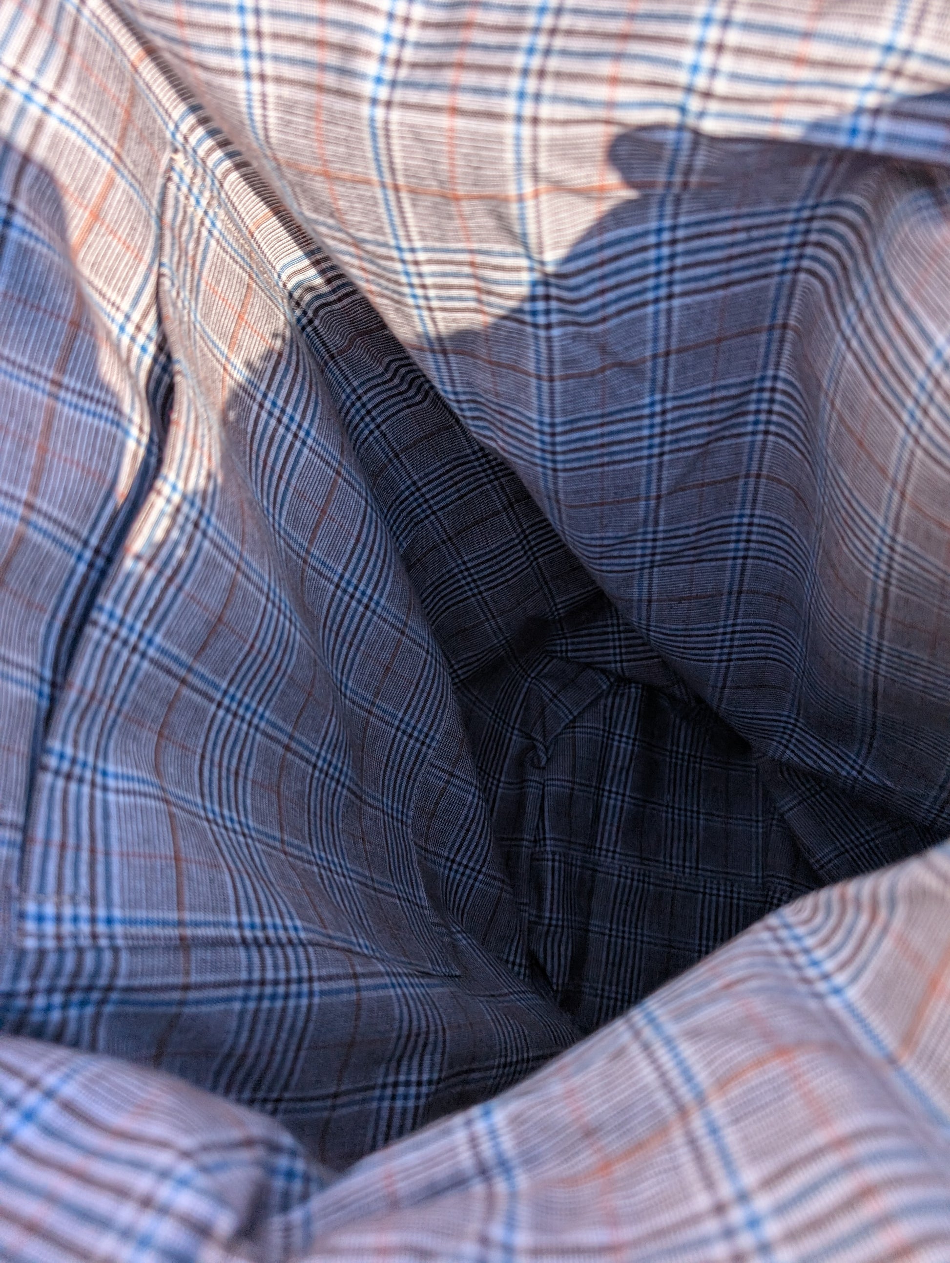 Close-up of plaid cotton lining with a focus on texture and pattern