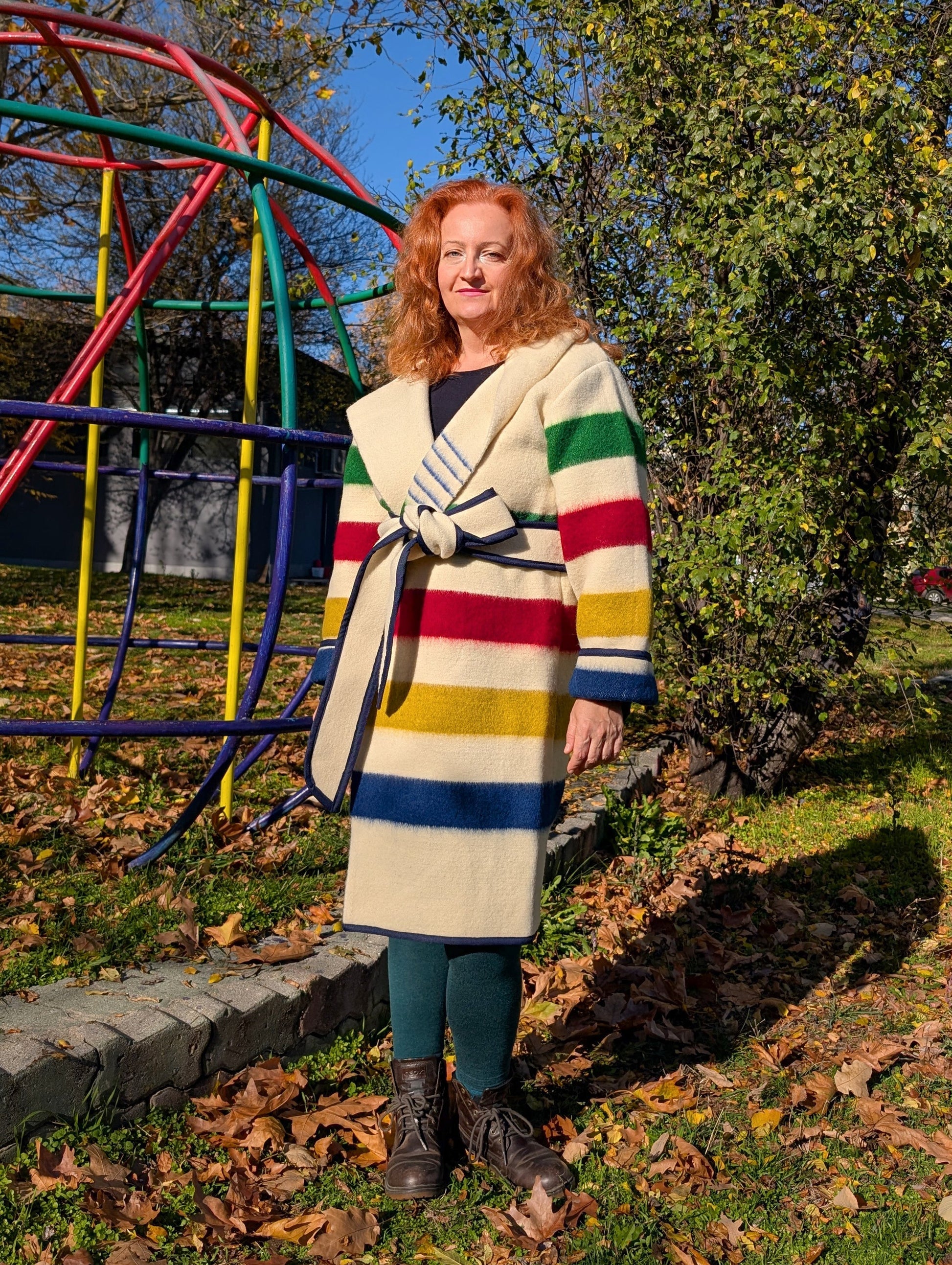 Native capote coat made from upcycled pure wool blanket with hood and belt.