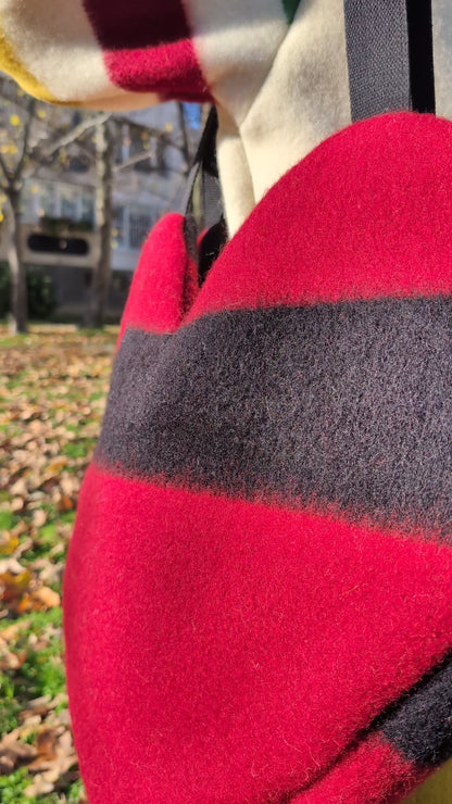 video of a large red heart shoulder ag or tote bag recycled from a luxurious traditional woolen blanket.