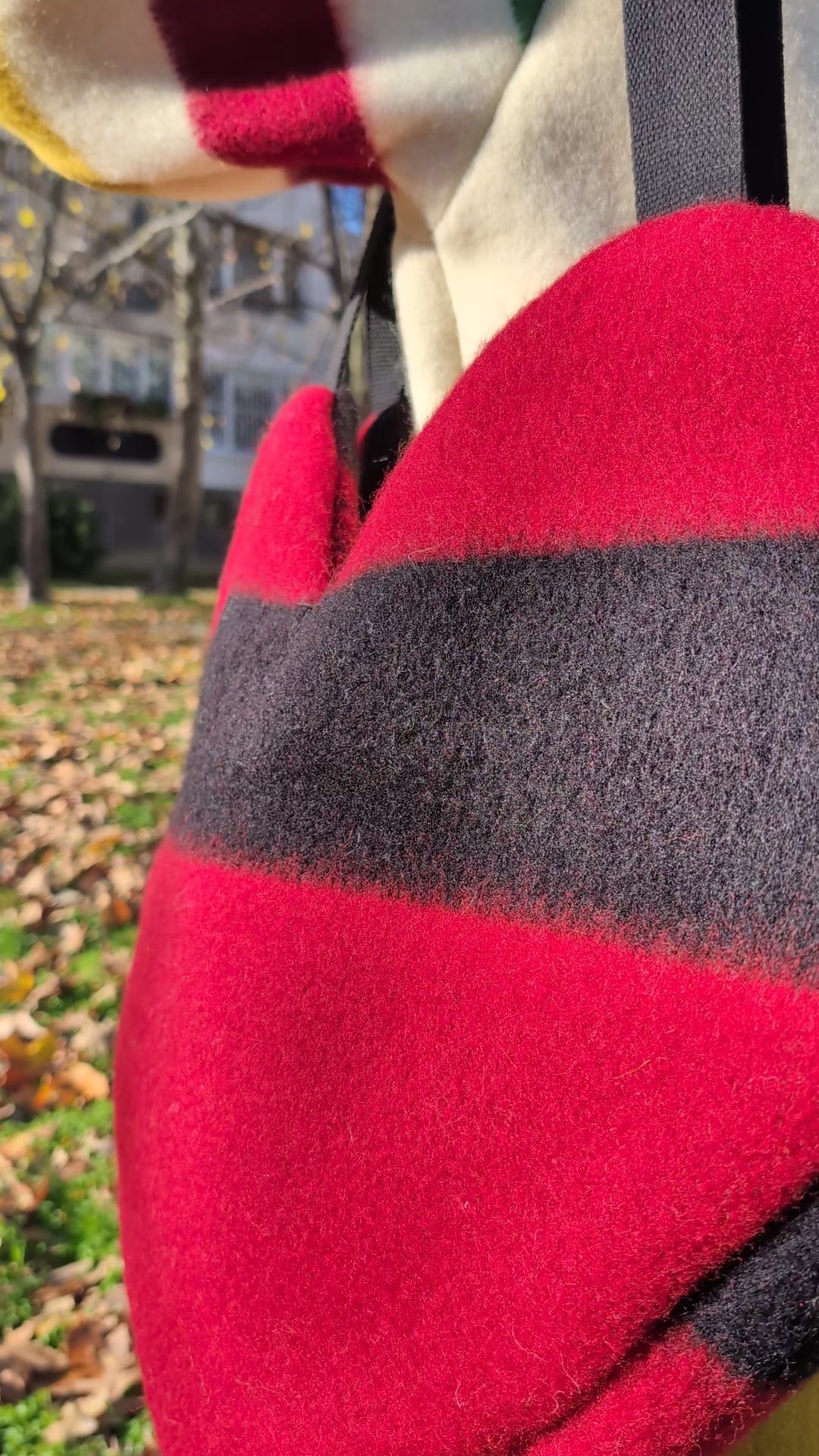 video of a large red heart shoulder ag or tote bag recycled from a luxurious traditional woolen blanket.
