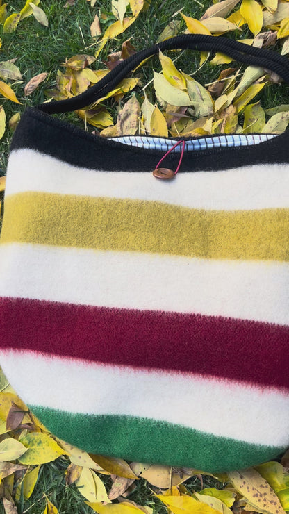 Video of a stylish functional statement tote bag with multicolor stripes, made from premium 100 percent wool blanket cuts.