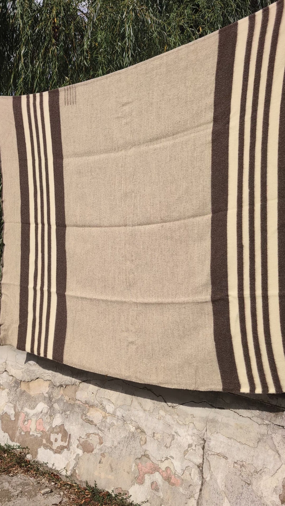 01-video-gray-striped-blanket-earth-tones